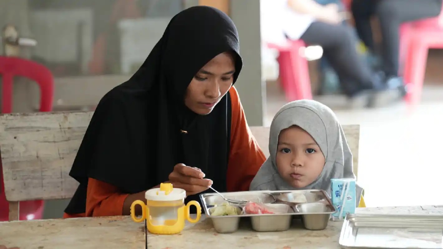 Ilustrasi balita menyantap hidangan dalam Program MBG (Foto: Istimewa)