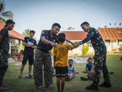 Di Sela Pekerjaan TMMD, Satgas Latih PBB Siswa Hadapi Lomba Gerak Jalan